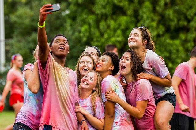 Students take a selfie after Color Wars battle